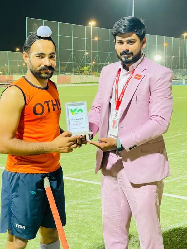 Handing over the club trophy — Stars 11 Hockey Club, Dubai